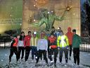 Runners in front of the Spirit of Detroit